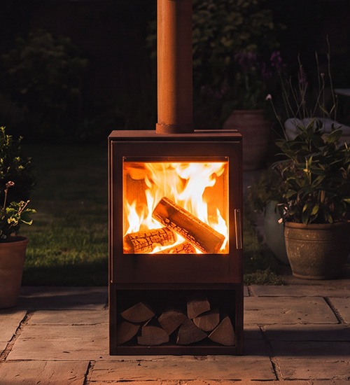 Woodford Outdoor Wood Burning Logstore Stove in Rust Finish